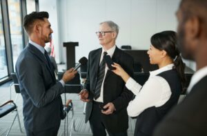 interviewed by journalists.