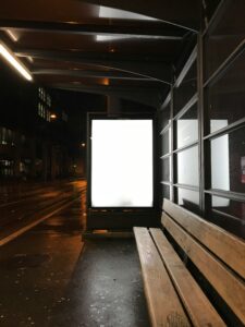 Billboard with no brand displayed at a bus stop.